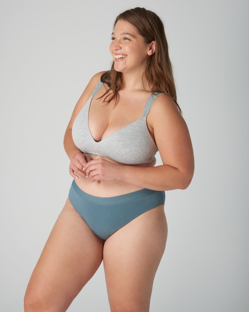 Side of a model wearing a size XL Period-Proof Organic Cotton Bikini - 3 tampon absorption in Mineral by Viita Protection. | dia_product_style_image_id:282281